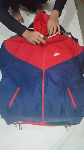 Nike and another brand sports jacket